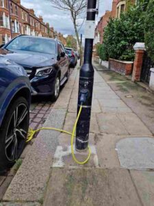Electric vehicle charging built into lamp posts on a residential London street