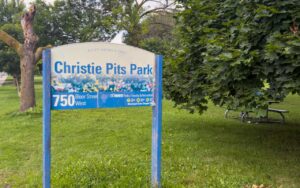 Christie Pits Park sign at 750 Bloor Street West in Toronto.