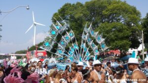 Toronto Caribbean Carnival parade participants and crowd celebrating Caribbean culture in Toronto.